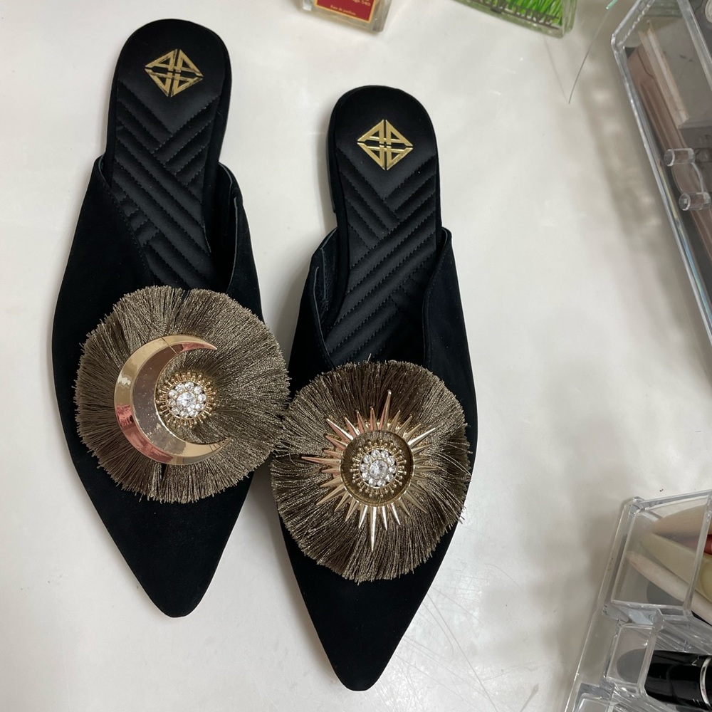 Never worn black Antonio Melani slip on mules. Size 10 but can also fit 9.5.